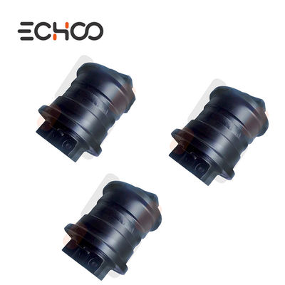 Sob componentes do trem de aterragem da pavimentadora de asfalto Vogele Super 1500 sob o rolo